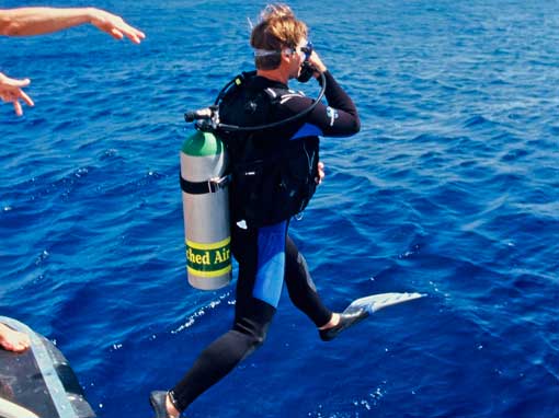 PADI Enriched Air Nitrox Specialty Course Student entering the water